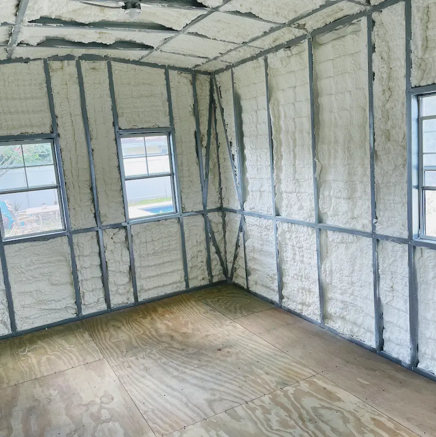 Closed-cell spray foam insulation applied to wall cavities in a residential project in Viera East